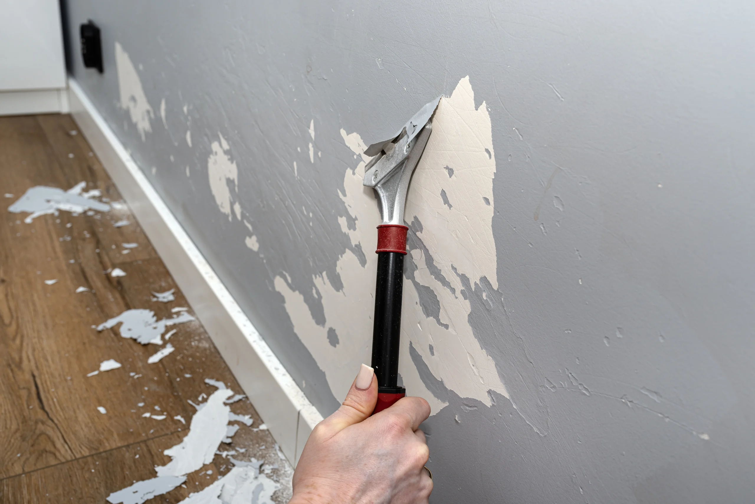 removing-lead-paint-from-a-wall-damaged-by-dog-